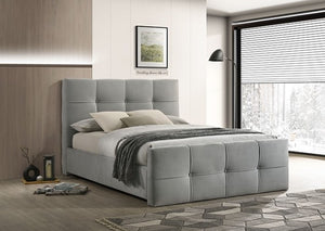 Koall Light Gray Fabric Biscuit Button Tufting Bed Gray upholstered bed in a modern bedroom setting with a large window.