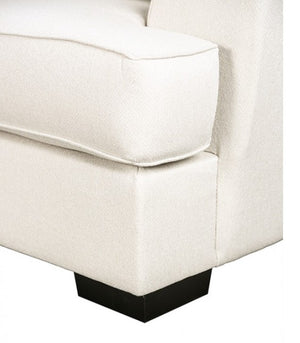 Kriska Light Gray Fabric Sofa with Pillows Close-up of a white upholstered chair with a black base on a white background