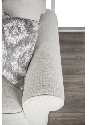 Kumar Rolled Arm White Fabric Sofa Gray textured throw blanket draped over a sofa with a wooden floor in the background
