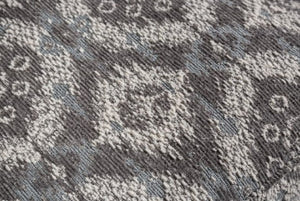 Close-up of a textured gray and white patterned fabric