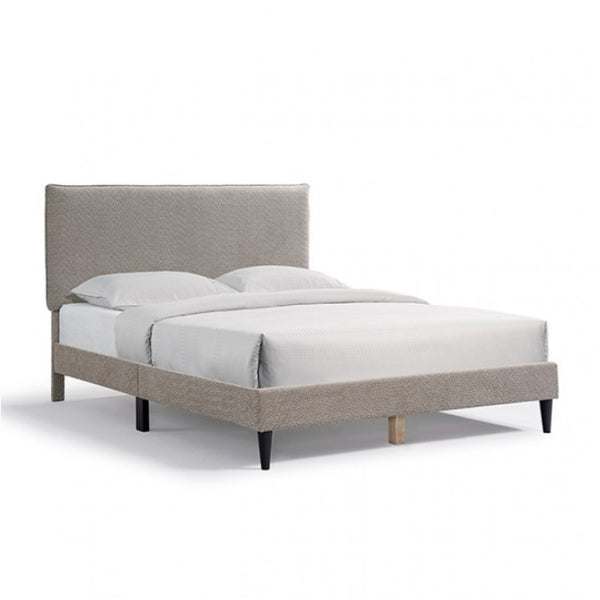 Gray upholstered bed with white bedding on a white background