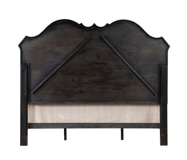 Lesley Button Tufted Camel Back Headboard Bed A rustic dark wood bed frame headboard with a distressed black finish, featuring a scalloped top, diagonal support beams, and a light beige woven fabric panel at the foot.