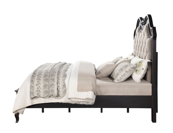 Lesley Button Tufted Camel Back Headboard Bed A bed frame with a tall, tufted headboard in black and beige, styled with neutral beige and gray patterned bedding and pillows, shown against a solid white background.