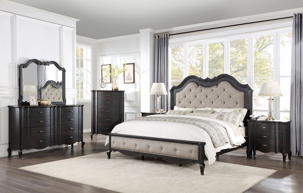 Lesley Button Tufted Camel Back Headboard Bed Neatly arranged bedroom with a bed, dresser, and mirror.