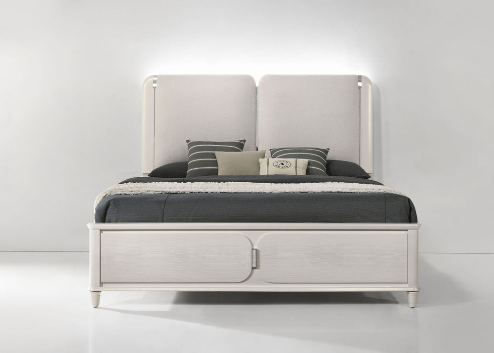Liberia Modern Bedroom Collection Modern bedroom set with white furniture, including bed, dressers, and nightstands, in a well-lit room.