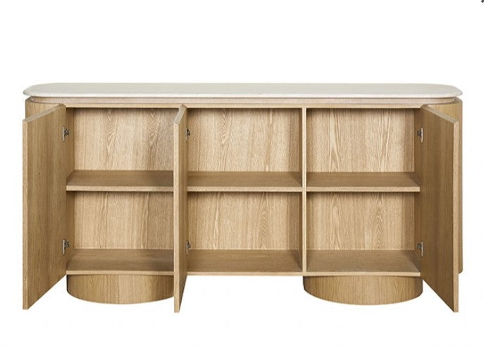 Limda Natural Sintered Stone Top Round Edges Server Wooden sideboard with a vase of pampas grass and decorative books against a neutral wall.