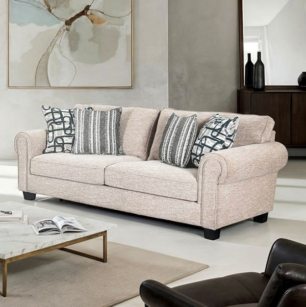 Logan Beige sofa with patterned cushions in a living room