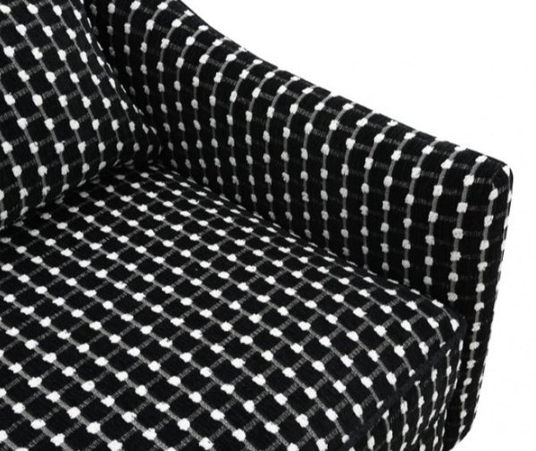 Logen Black Dots Chenille Fabric Accent Chair Black and white checkered sofa on a white background