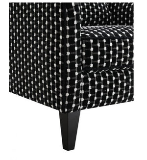 Logen Black Dots Chenille Fabric Accent Chair Black and white patterned chair on a white background