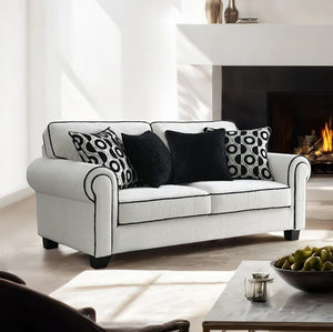 Logen White Chenille Fabric Loveseat With Pillows Gray sofa with patterned cushions in a living room setting.