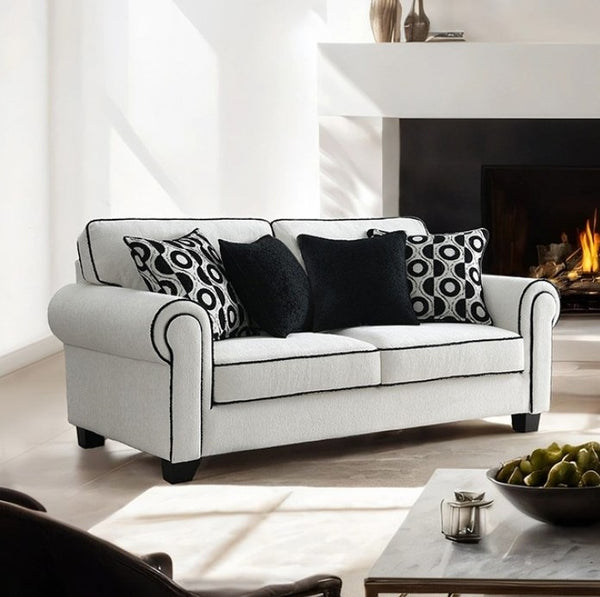 Logen White Chenille Fabric Loveseat With Pillows Gray sofa with patterned cushions in a living room setting.