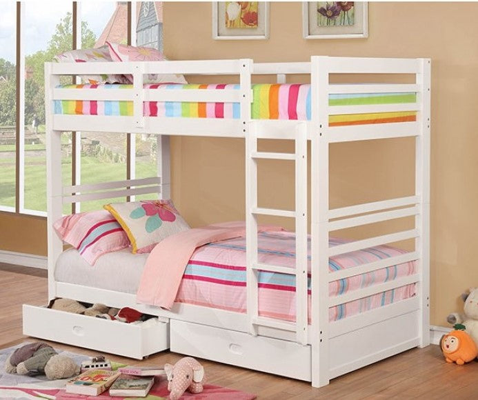 Lukka Twin Twin White Storage Drawers Bunkbed White bunk bed with colorful bedding in a room with toys and books on the floor.