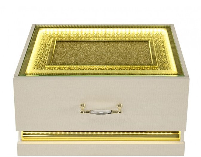 Luna Modern Beige Gold Accent Led Nightstand White nightstand with gold accents in a bedroom setting