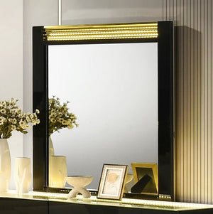 Luna Modern Black Gold Accent Led Mirror Decorative mirror with LED lighting on a shelf with decorative items.