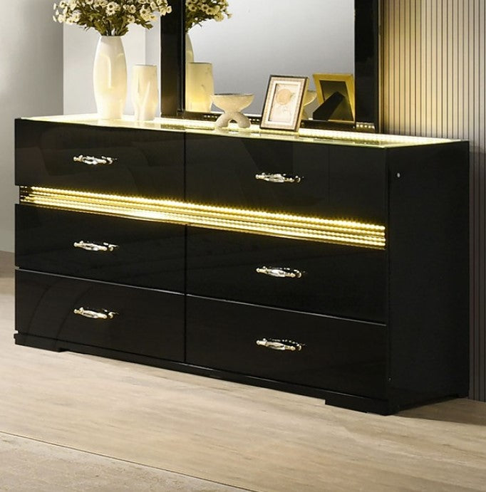 Luna Modern Black Gold Accent Led Mirror Decorative mirror with LED lighting on a shelf with decorative items.