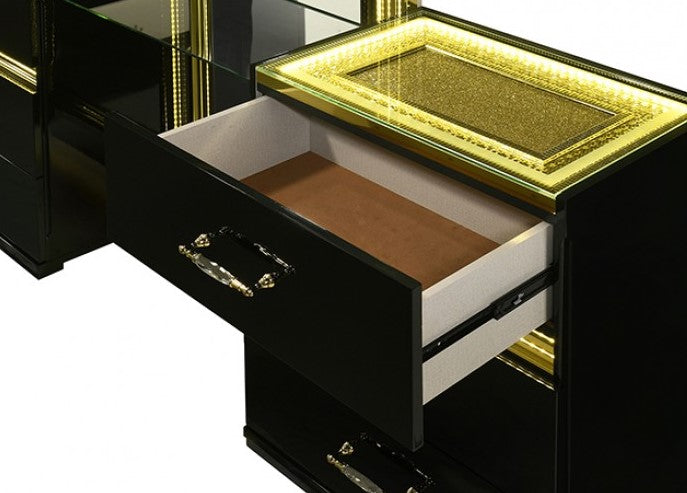 Luna Modern Black Gold Accent Vanity Modern black dresser with gold accents in a stylish room.