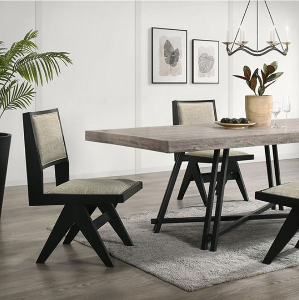 Maeve Rectangular Contemporary Black Finish Dining Table Dining room with a wooden table and chairs on a gray rug, plants, and wall art.