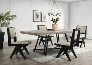 Maeve Rectangular Contemporary Black Finish Dining Table Dining room with a wooden table and black chairs on a light wood floor.