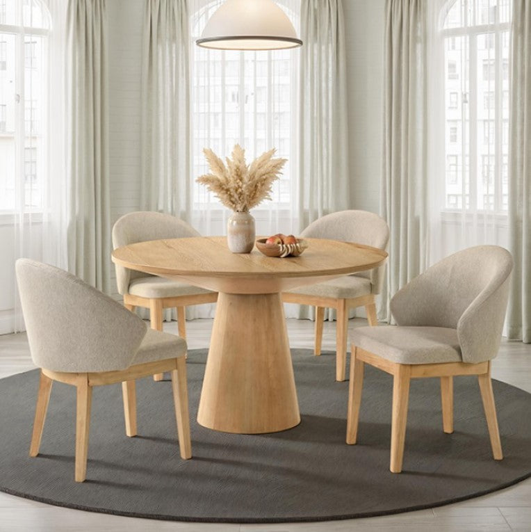 Maeve Round 48" Contemporary Oak Finish Dining Table Dining room with a wooden table and chairs in a bright room.