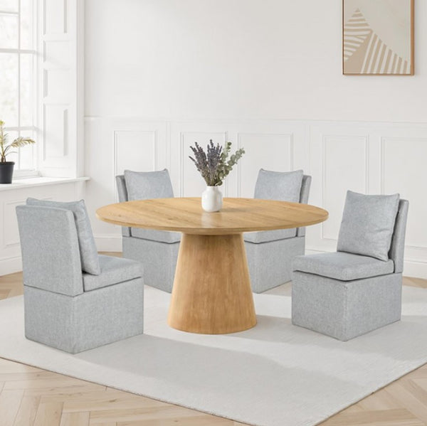 Dining room with a wooden table and gray chairs on a white rug.