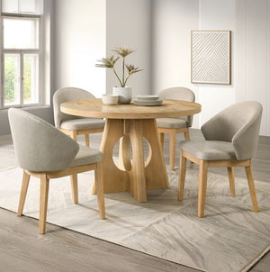 Maeve Round Organic Modern Oak Finish Dining Table Dining room with a round wooden table and four gray chairs.