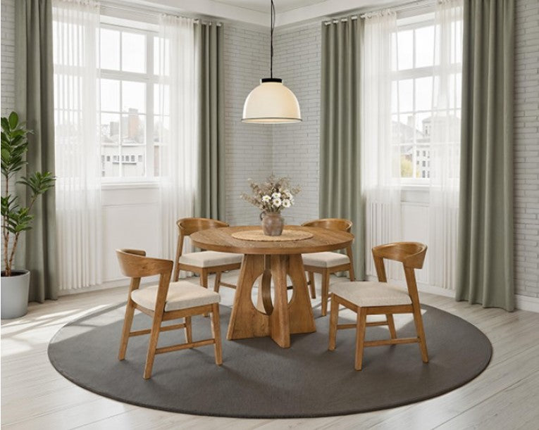Maeve Round Organic Modern Walnut Finish Dining Table Wooden dining table with chairs in a bright room