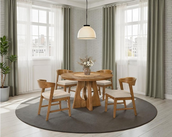 Maeve Round Organic Modern Walnut Finish Dining Table Dining room with wooden table and chairs in a well-lit room with large windows and curtains.