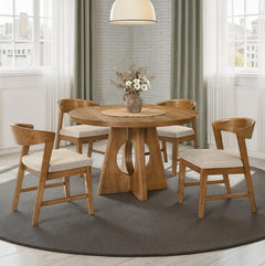 Maeve Round Organic Modern Walnut Finish Dining Table Wooden dining table with chairs in a bright room