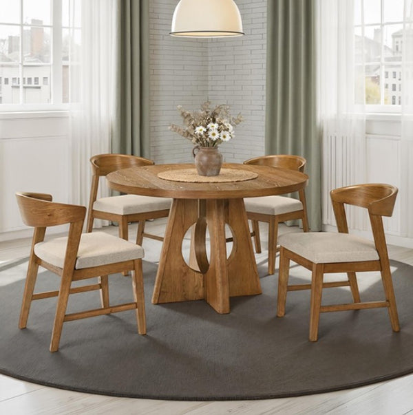 Maeve Round Organic Modern Walnut Finish Dining Table Wooden dining table with chairs in a bright room