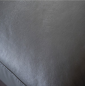 Matteo Modern Style Dark Gray Adjustable Headrest Leather Sectional Sofa Close-up of gray leather texture
