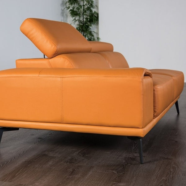Matteo Modern Style Tangerine Adjustable Headrest Leather Sectional Sofa Orange leather sofa on a wooden floor with a neutral background
