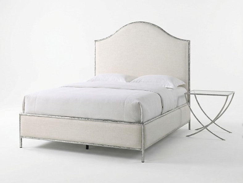 Melan Fabric Chrome Metal Two Tone Bed Neatly made bed with decorative pillows in a bedroom setting
