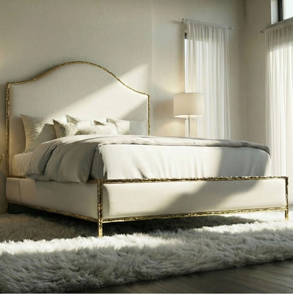 Melan Fabric Metal Two Tone Bed Neatly made bed with gold headboard in a bright bedroom