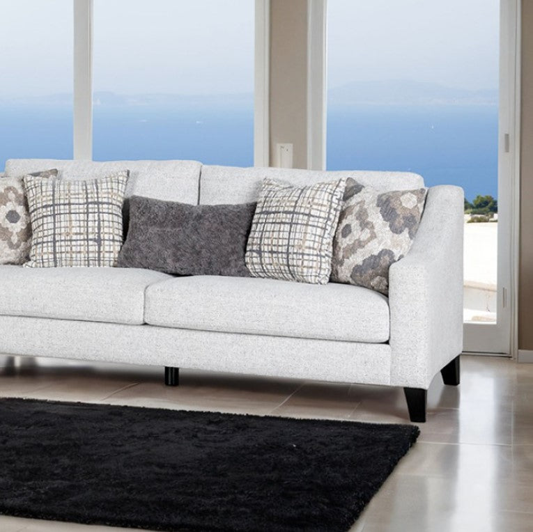 Mercia Sloped Track Arm Sofa Gray sofa with patterned cushions in a living room setting