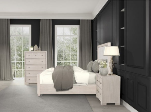 Montague Cross Modern Classic Fabric Tawny Bed A modern bedroom featuring a light wood bed frame, matching nightstand and dresser, a black paneled headboard wall, gray curtains, and a gray carpet.