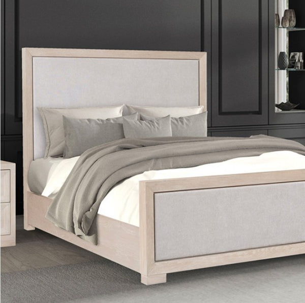 Montague Cross Modern Classic Fabric Tawny Bed Neatly made bed with gray bedding in a bedroom setting