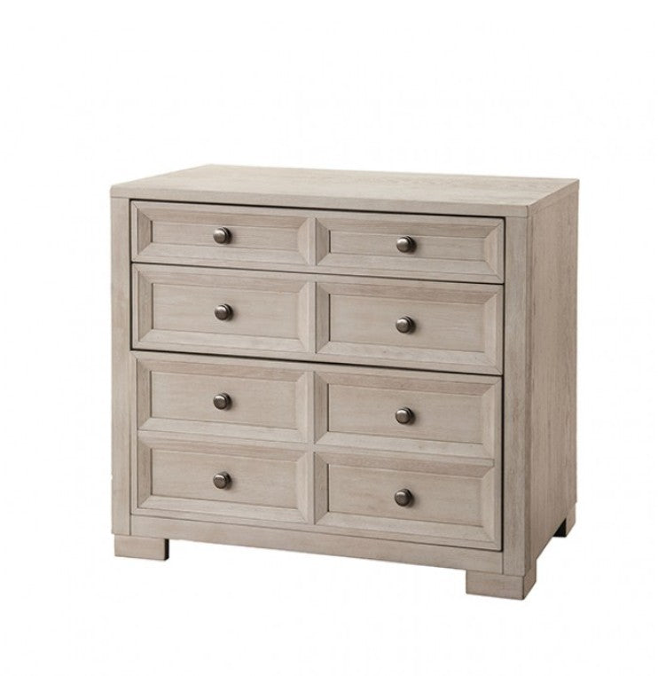 Montague Cross Modern Classic Tawny Credenza Light wood dresser with four drawers against a gray wall.