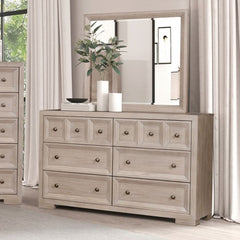 Montague Cross Modern Classic Tawny Dresser A light beige wood dresser with six drawers and a matching rectangular mirror, styled in a bedroom setting with curtains, candles, and a plant.