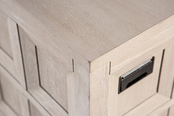 Montague Cross Modern Classic Tawny Executive Desk Close-up of a light beige wood storage cabinet corner with a black metal mail slot on the front drawer.