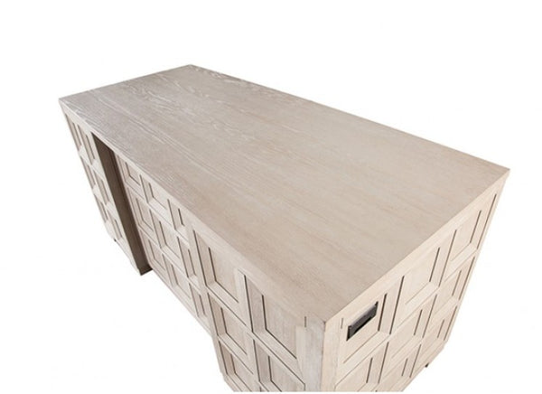 Montague Cross Modern Classic Tawny Executive Desk A light beige wood console table with a geometric, textured geometric pattern on the sides, shown from an elevated angle on a white background.