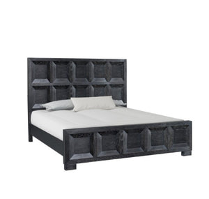 Montague Cross Modern Classic Weathered Black Bed A dark gray wooden bed frame with a high, geometrically paneled headboard and matching footboard, shown with white bedding and two pillows on a solid white background.