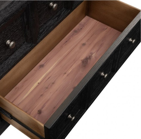 Montague Cross Modern Classic Weathered Black Oversized Nightstand Close-up of a dark wood drawer with one drawer pulled open, showing a natural wood interior base and silver drawer knobs against a white background.