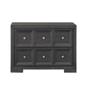 Montague Cross Modern Classic Weathered Black Oversized Nightstand A dark gray wooden dresser with six drawers arranged in two rows of three, each featuring a small round silver pull knob, shown against a plain white background.