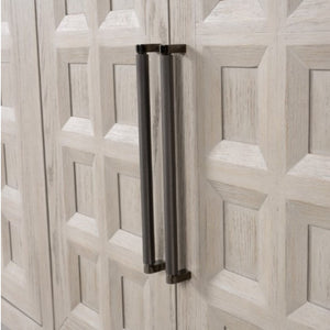 Montague Cross Modern Style Dining Server A close-up of a light wood cabinet door with a geometric raised panel design, featuring two long, dark metal bar handles mounted vertically.