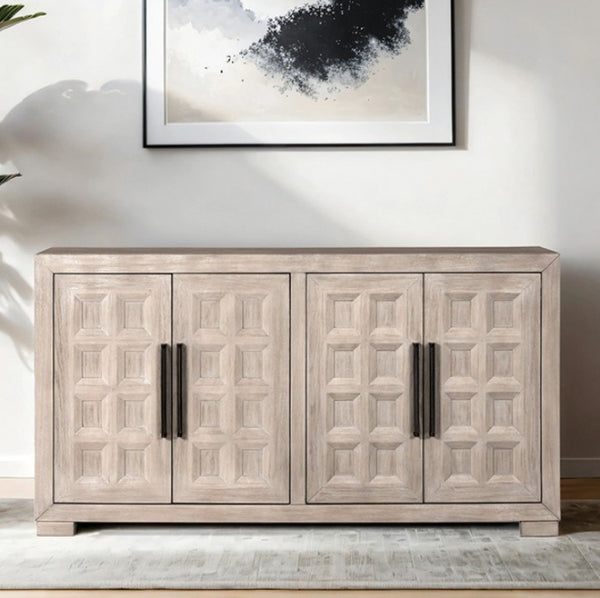 Montague Cross Modern Style Dining Server Wooden cabinet with decorative doors and black handles in a room with a painting on the wall.