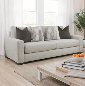 Nareen Gray Fabric Loveseat with Multicolor Pillows Gray sofa with decorative pillows in a living room setting.