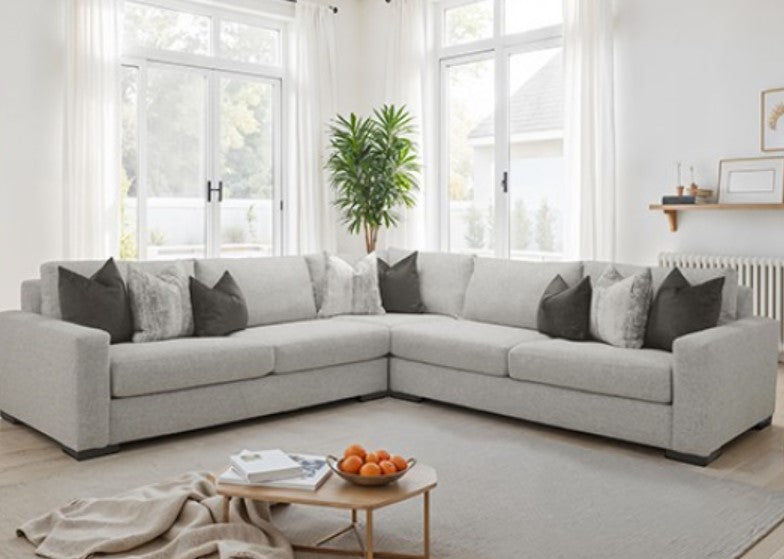 Nareen Gray Fabric Sectional Sofa with Multicolor Pillows Modern living room with a sectional sofa, coffee table, and decorative elements.
