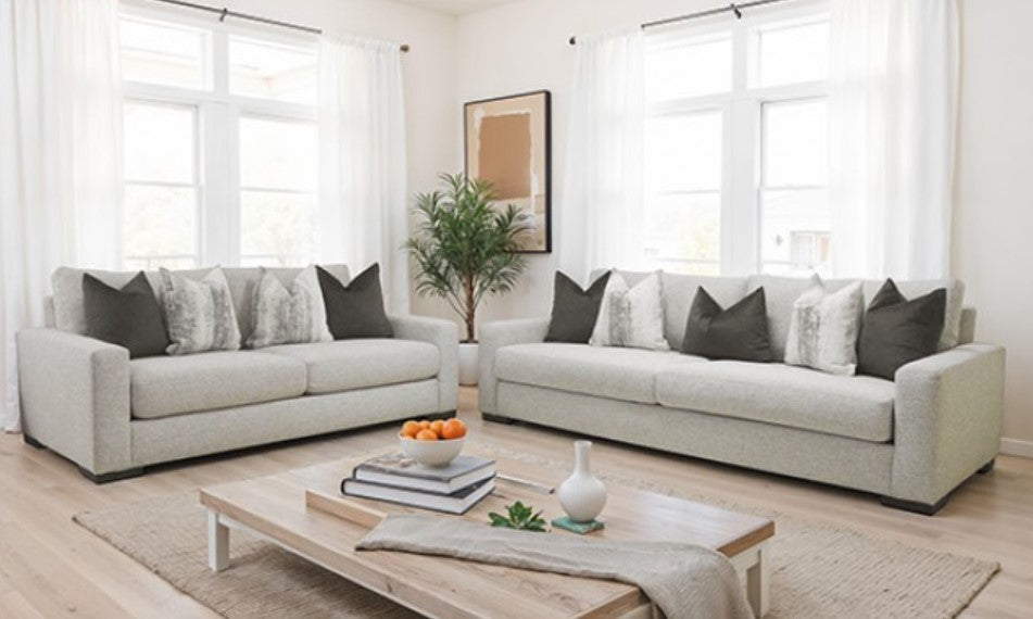 Nareen Gray Fabric Loveseat with Multicolor Pillows Gray sofa with decorative pillows in a living room setting.