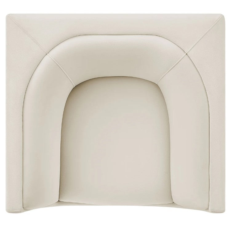 Natalia Alabaster Velvet Fabric Chair Beige armchair in a room with a large window view of greenery