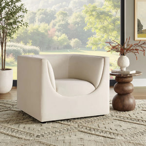 Natalia Alabaster Velvet Fabric Chair Beige armchair in a room with a large window view of greenery